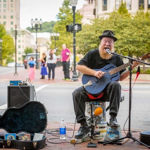 Busker in Pack Square - Square Busker in Pack Square - Square