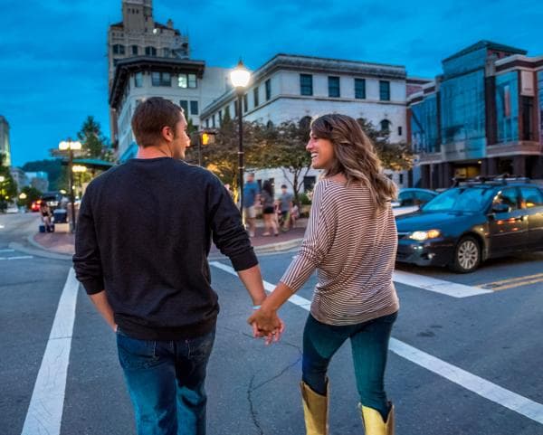 Couple Strolling in Downtown Asheville Couple Strolling in Downtown Asheville