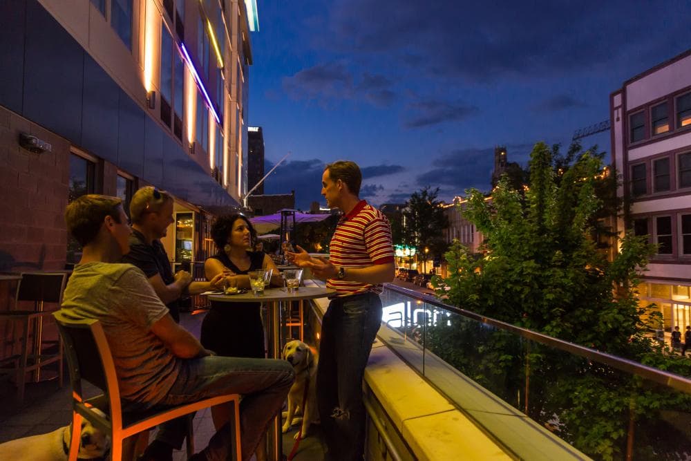 Enjoy views of downtown Asheville from the WXYZ Lounge rooftop bar Enjoy views of downtown Asheville from the WXYZ Lounge rooftop bar